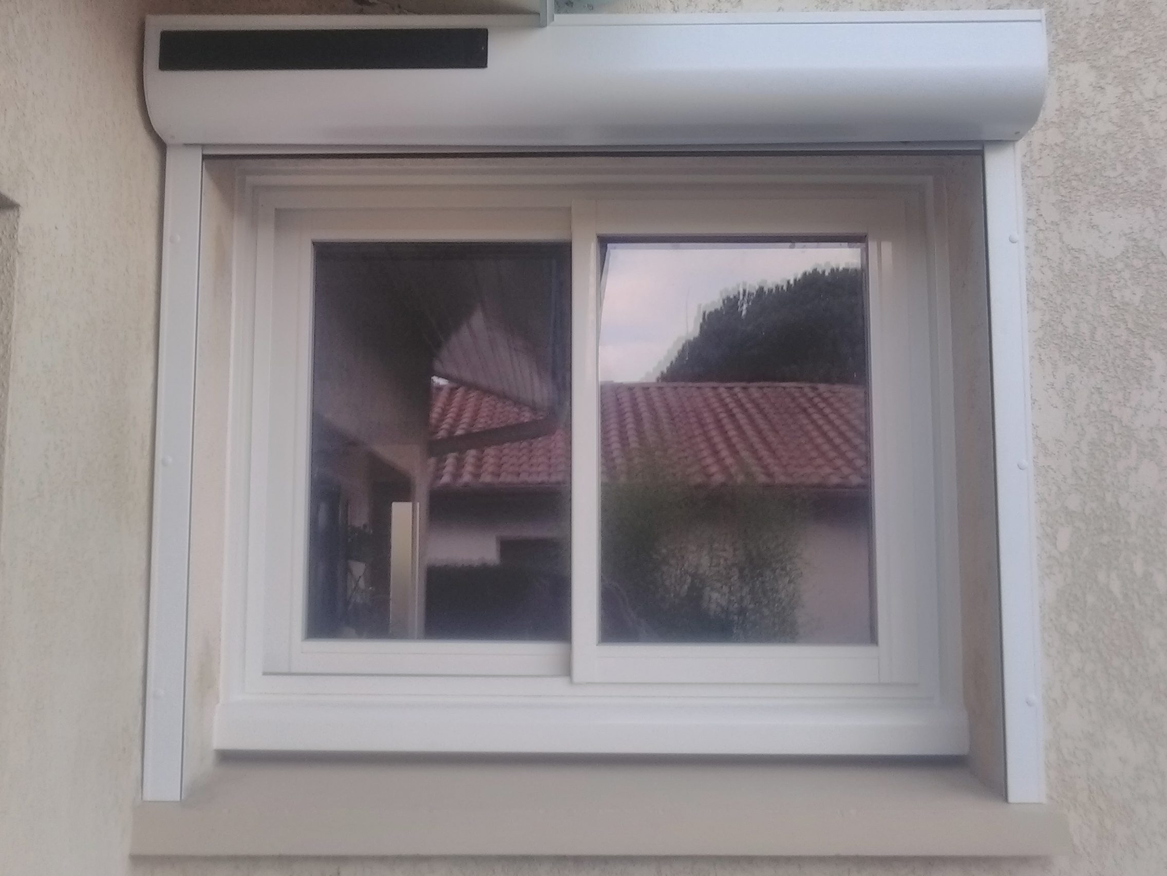 pose de volets roulants après